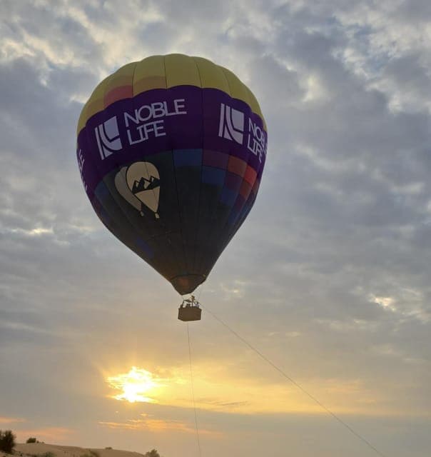 8. Noble Life Sunrise Hot Air Balloon Ride Over Dubai Desert - Image 8