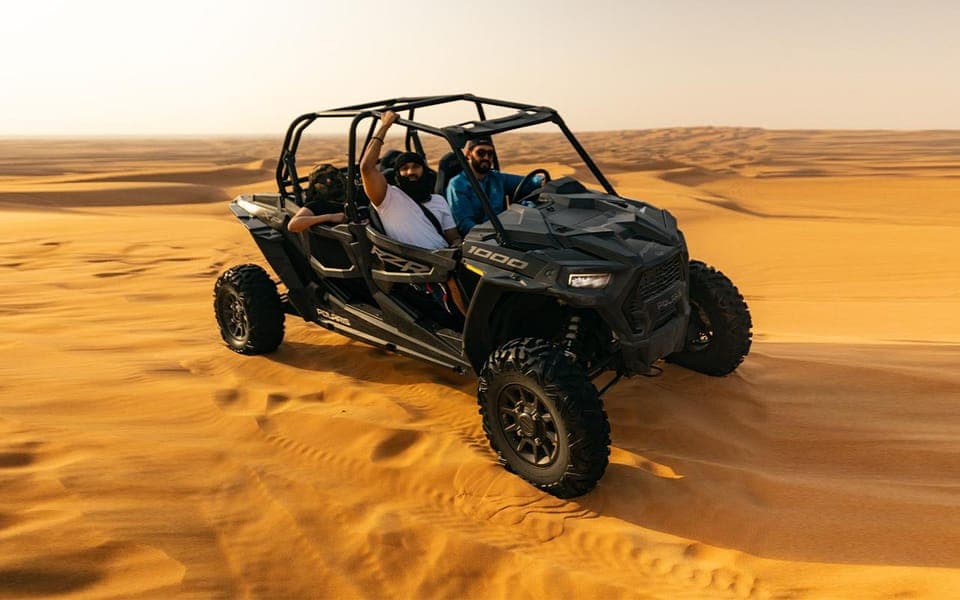 Buggy Dune Bashing, Sand Boarding, Camel Ride & Show Gallery Image 1